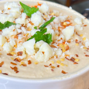 Homemade Hummus is a cinch to make! Once you make your own, you will never buy store bought again! Not to mention, this Queso Hummus will quickly become a household favorite!